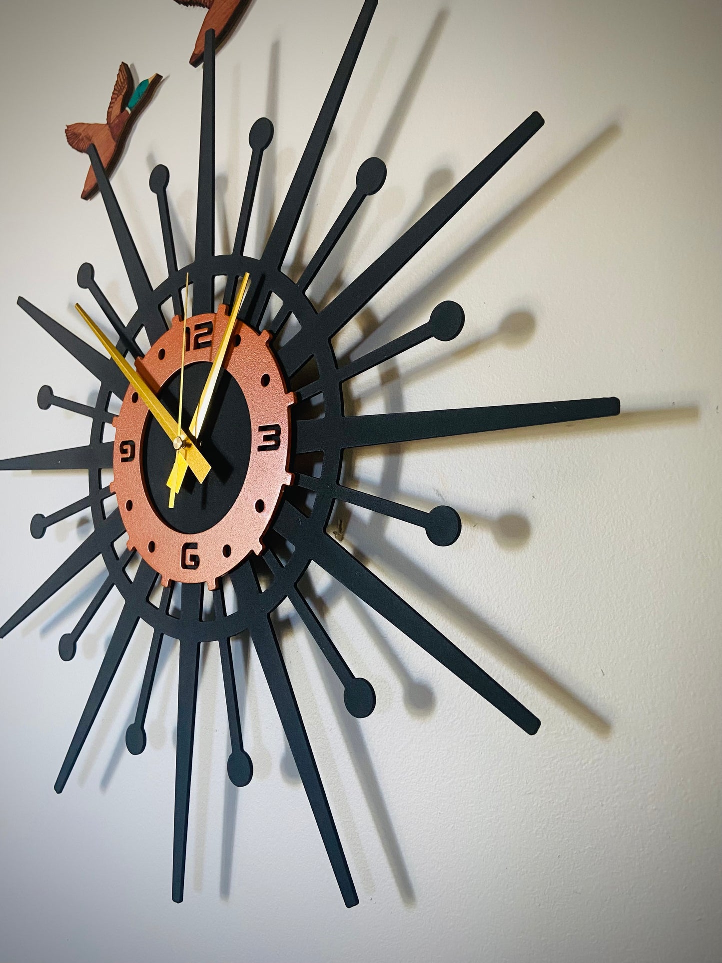 Retro Coast Midcentury Metal Starburst Clock.