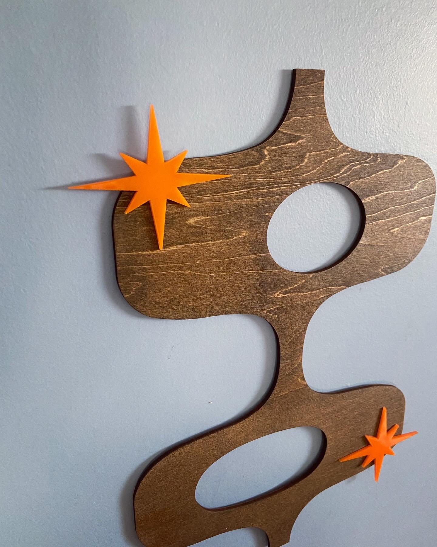 Retro Coast Midcentury - Laser Cut Abstract Shape with Orange Acrylic Starbursts.