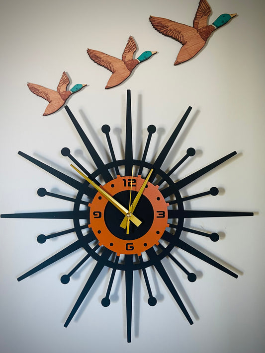 Retro Coast Midcentury Metal Starburst Clock.