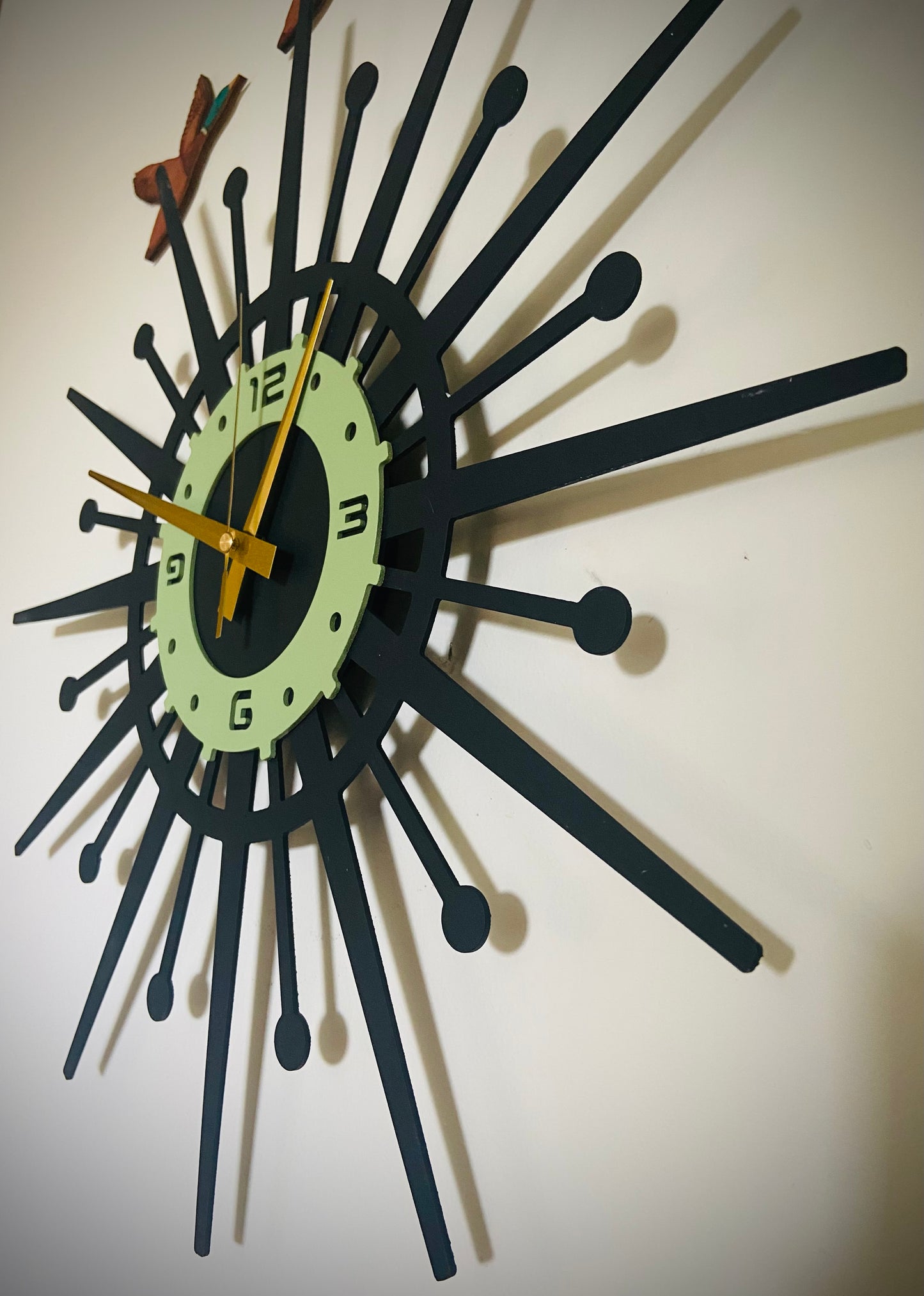 Retro Coast Green Starburst Clock.